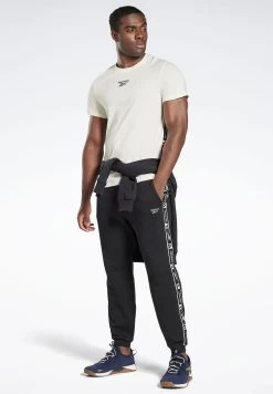 Reebok Logo Tape T-Shirt 11 Reebok Logo Tape T-Shirt -Fit Mode Shop 5 zoom desktop 211