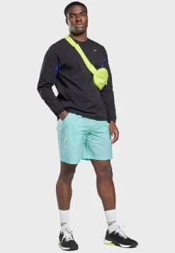 Reebok Les Mills Woven Shorts 11 Reebok Les Mills Woven Shorts -Fit Mode Shop 5 zoom desktop 265